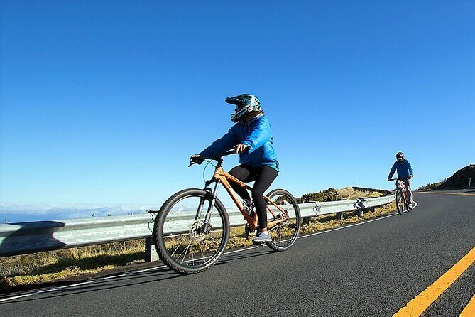 Haleakala Express Self-Guided Bike Tour with Bike Maui - Weather reality: clouds can steal the views