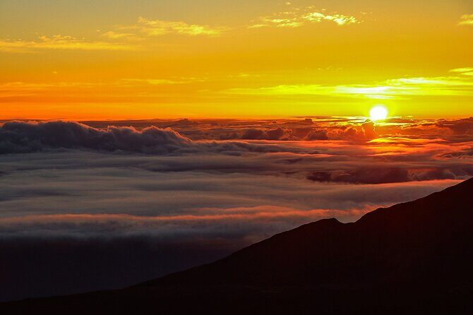 Maui: Majestic Haleakala Sunrise Tour with Pick-up - Haleakalā Crater at sunrise: prepare for wind, clouds, and patience