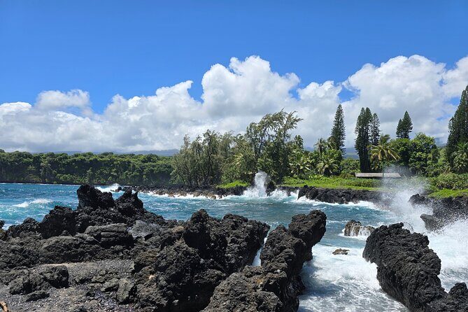 Private Road to Hana Tour with Pickup - Koki Beach: red sand, sea arch views, and huli huli energy